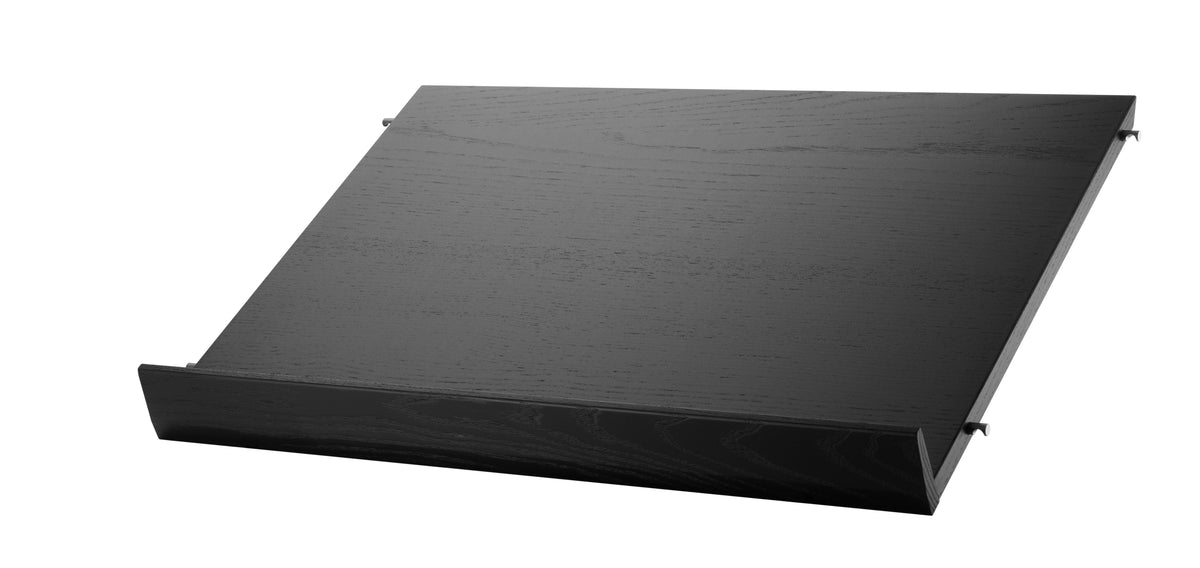 Magazine shelf solid w58 x d30 cm in Black stained ash, room setting