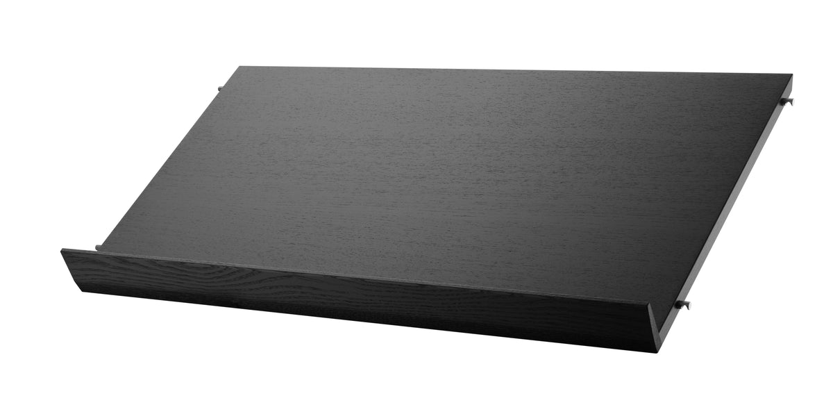 Magazine shelf solid w78 x d30 cm in Black stained ash, room setting