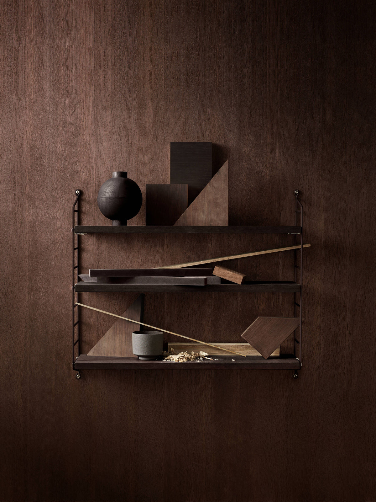 String Pocket in Black, room setting